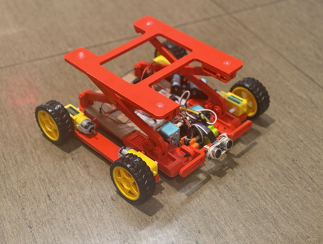 The completed robot on the floor before a test run